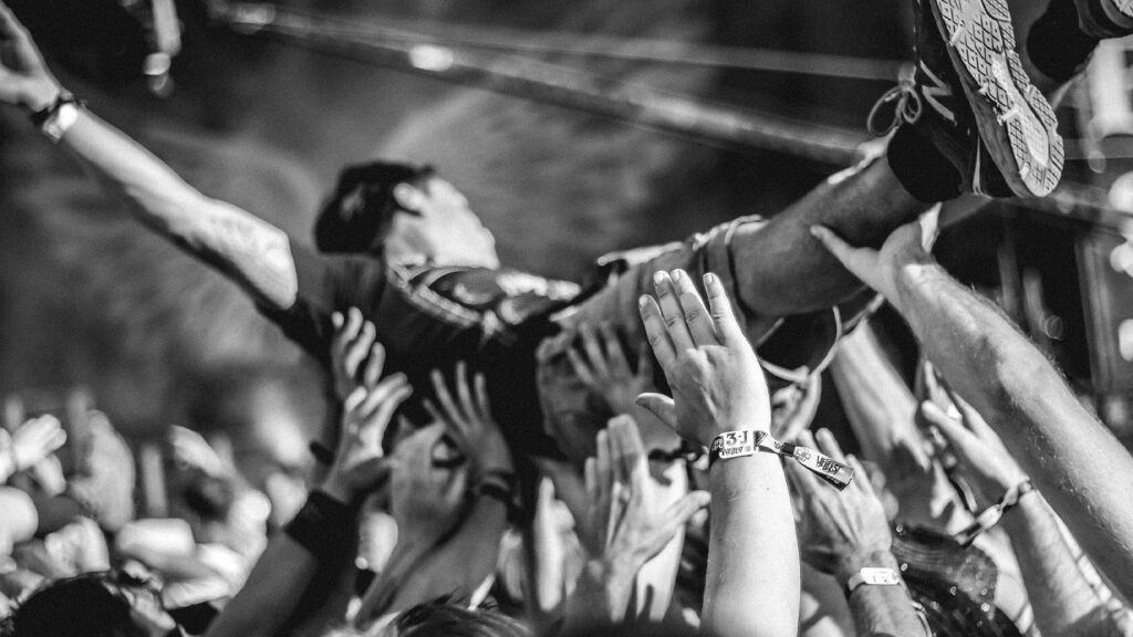 Crowd surfing at a music festival